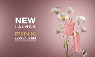 Pink bodycare set with flowers on a pink background from Atyab Al Marshoud