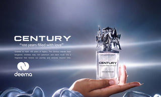 A hand holds a Century Eau de Parfum bottle against a dramatic blue and gray background with light rays. The bottle is clear glass with a silver cap and features the Century logo.