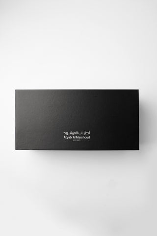 Black rectangular box with white text on a white background by Ayab Al Marshoud.